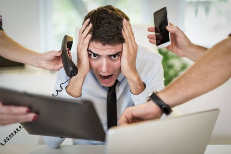 Overworked Businessman – Workplace Anxiety – Safe Place Therapy
